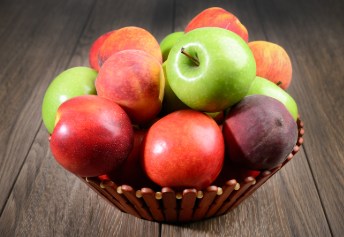 basket of red and green apples